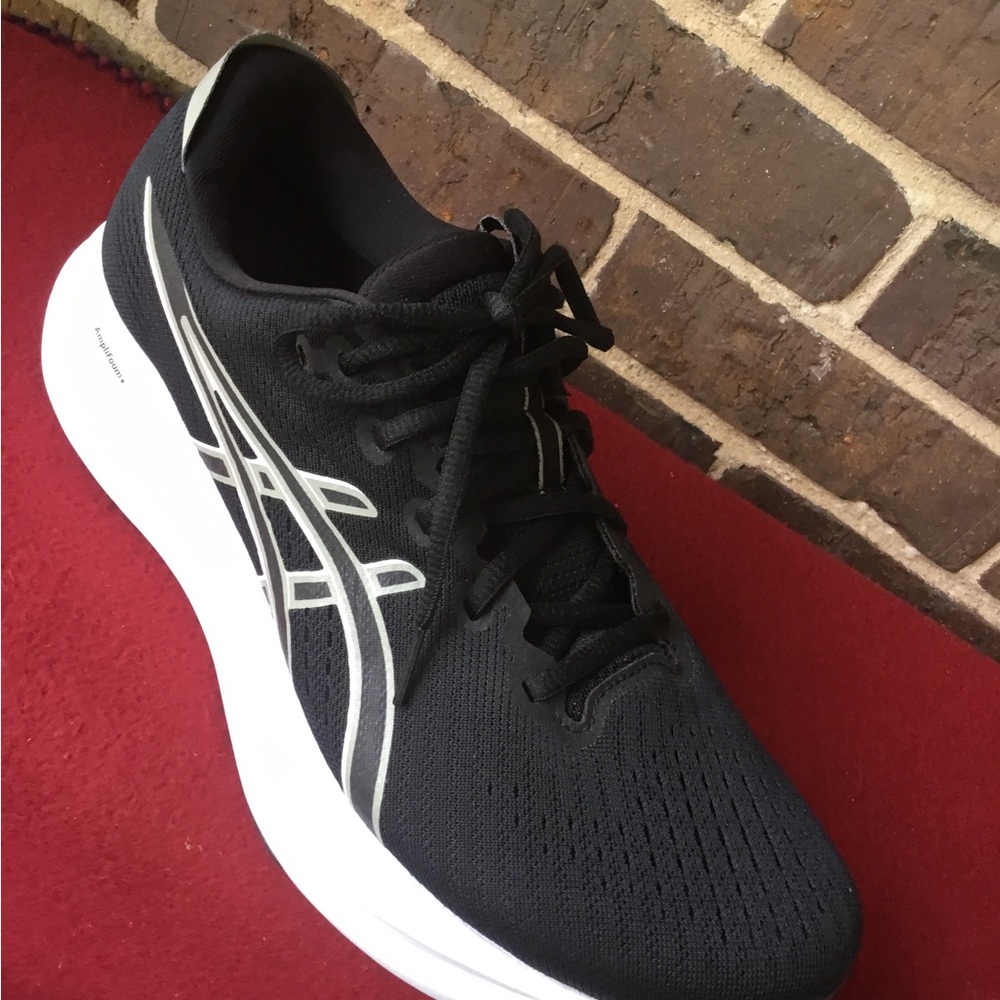 ASICS Black Running Shoe with White Sole and Silver Accents